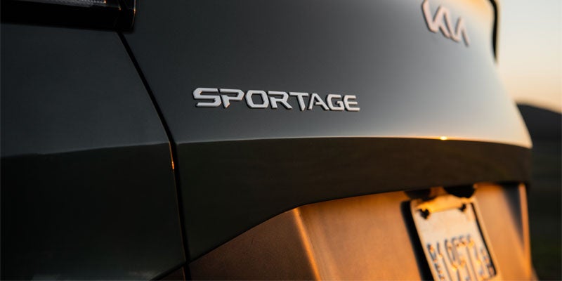 The Sportage nameplate on the back of a Kia