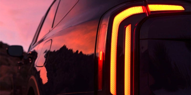 A close-up of a Kia Telluride's red LED taillight.